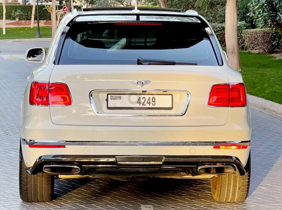 White Bentley Bentayga 2019 for rent in Ajman 4